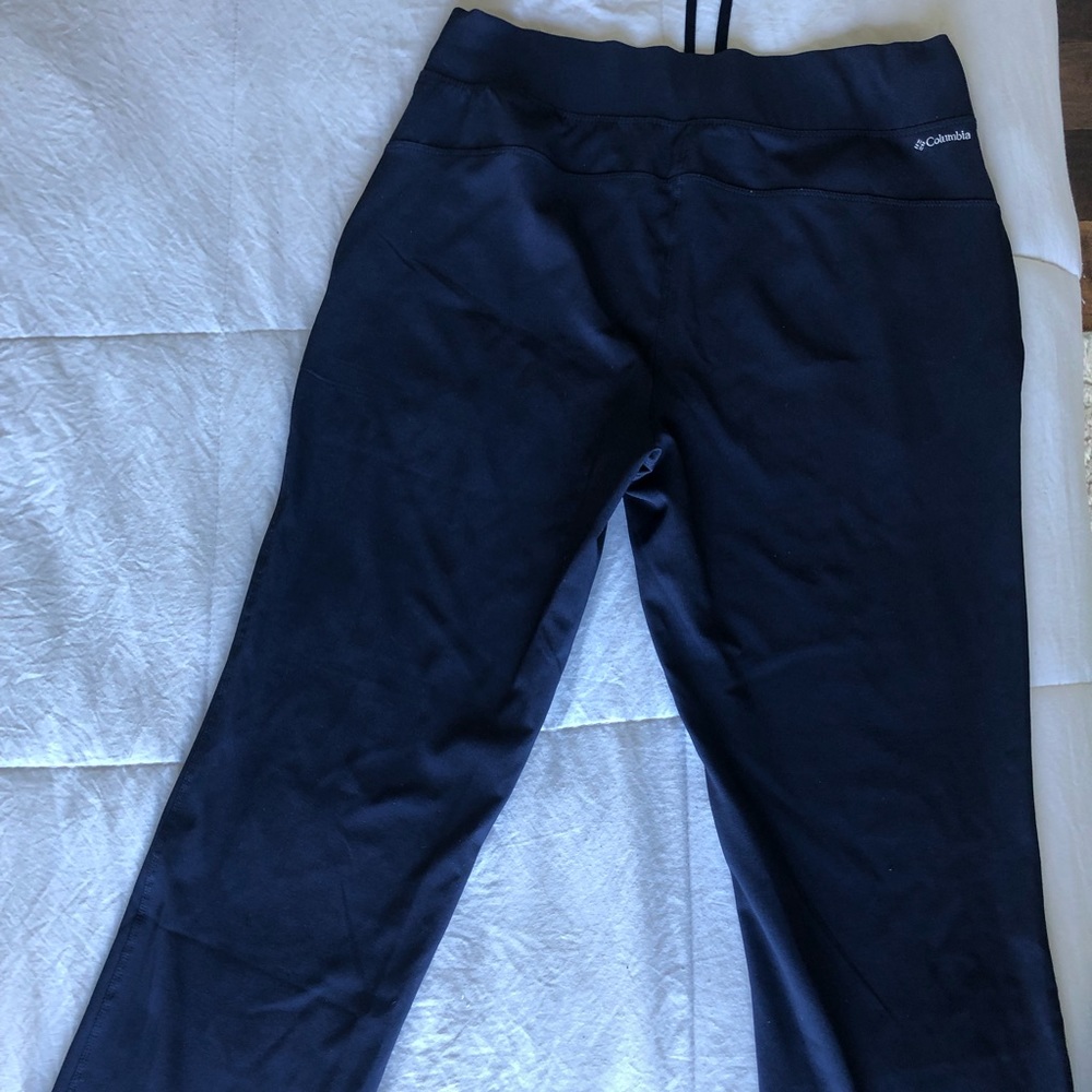 Navy blue Columbia slacks with zip pockets